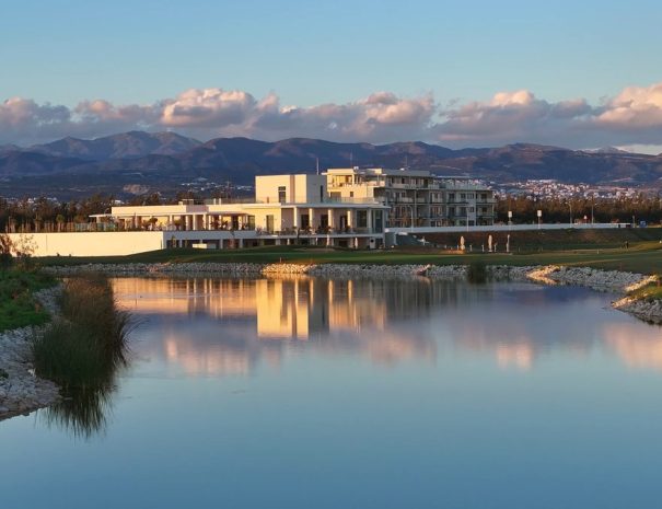 Limassol Greens clubhouse and lake at sunset